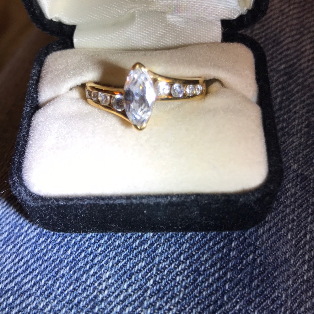 Lab created white topaz and gold ring. Size 8.